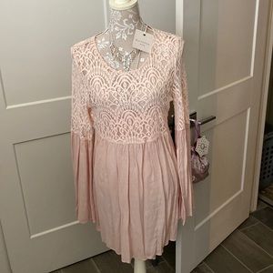 A beautiful peach tunic looks great with everything.